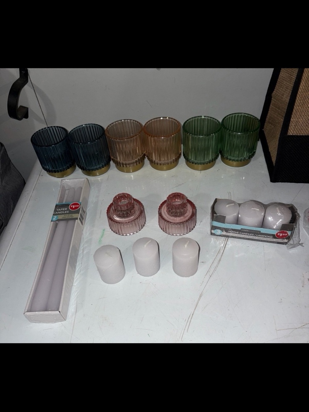 Assortment of candles and candle holders